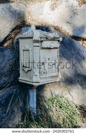 Very old mailbox near the Randol Abbey, situated at Randol near the village of Saint-Saturnin, France. Translation: 