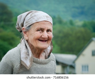 Very Old Rural Woman Smiling Outside During The Day