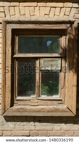 Similar – Rusty window with flower pots