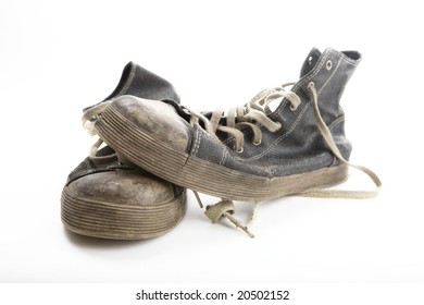 Very Old Sneakers Isolated On White.