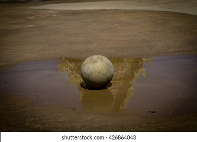 Very Old Soccer Ball On The Water 