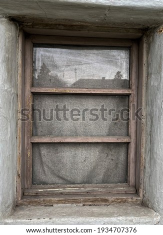 Similar – Rusty window with flower pots