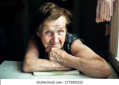 A Very Old Woman, A Portrait In Her House.