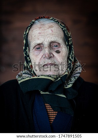 Very old woman with scarf portrait
