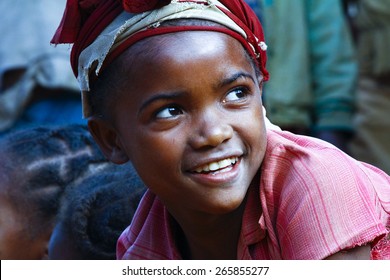 Very Pretty Malagasy Child Smiling In The Village- Poverty