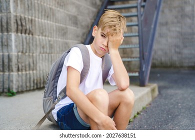 A Very Sad Boy Bullying In School Playground.