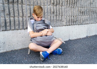 A Very Sad Boy Bullying In School Playground.