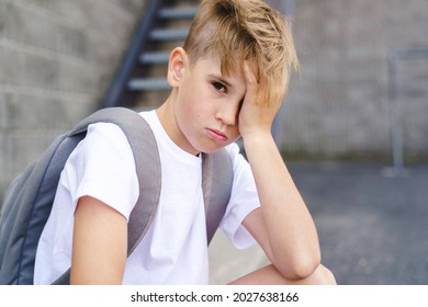 A Very Sad Boy Bullying In School Playground.