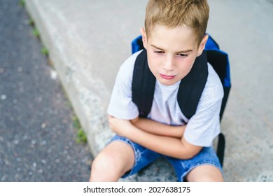 A Very Sad Boy Bullying In School Playground.