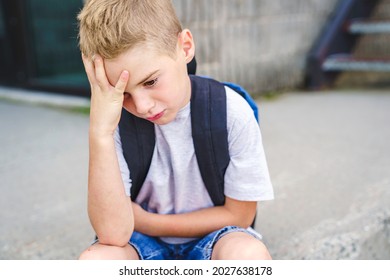 A Very Sad Boy Bullying In School Playground.