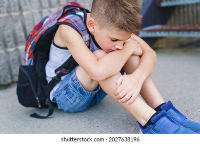 A Very Sad Boy Bullying In School Playground.