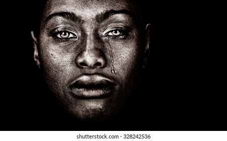 Very strong Image Of a afro American woman Crying  isolated on Black