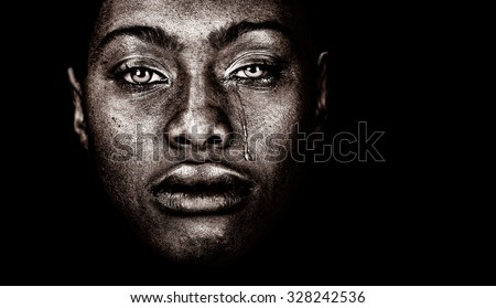 Very strong Image Of a afro American woman Crying  isolated on Black