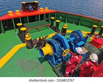 Vessel Crew, Able Body Seaman Handling Anchor At Anchor Station Onboard Marine Offshore Vessel. 