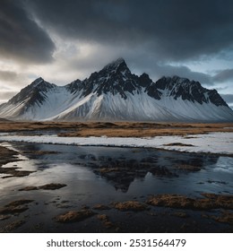 Vestrahorn is a dramatic, isolated mountain on Iceland's southeastern coast, known for its jagged peaks and stark beauty. Rising sharply from a black sand beach, its rugged silhouette is often - Powered by Shutterstock