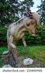 VESZPREM, HUNGARY - AUGUST 17, 2021: Plastic dinosaur in the zoo. Dimetrodon statue.