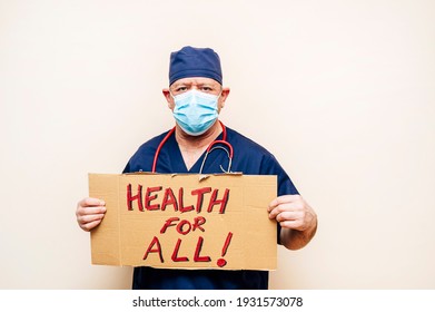 Veteran Doctor Holding A Sign Up High That Says Health For All