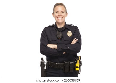 VETERAN POLICE OFFICER | Happy policeman posing with arms crossed against white background