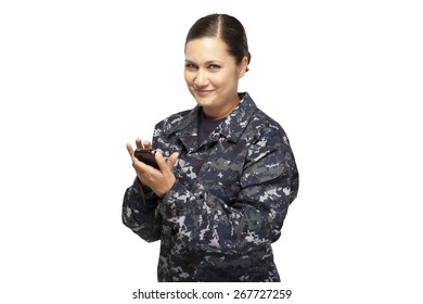 Veteran Soldier | Portrait Of Smiling Female Navy Sailor Text Messaging