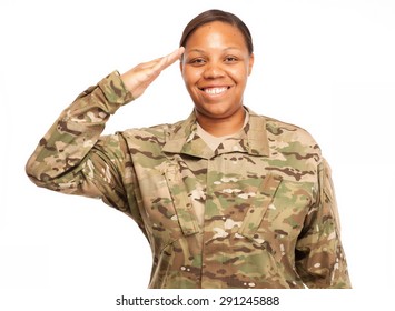 Veteran Soldier Saluting And Smiling. African American Woman In The Military.