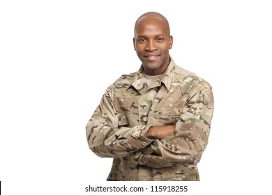 Veteran Soldier smiling with his arms crossed - Powered by Shutterstock