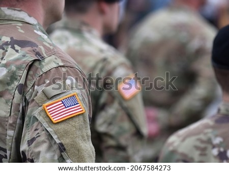 Veterans Day. US soldiers. US army. USA patch flag on the US military uniform. United States Armed Forces. 