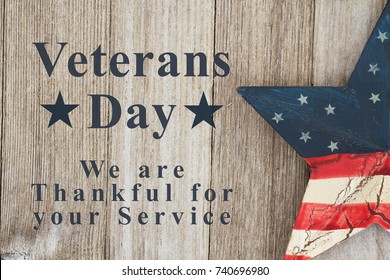Veterans Day we are thankful for your service text with USA patriotic old star on a weathered wood