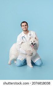 Veterinarian With Cute Dog On Color Background