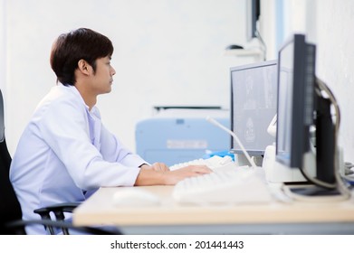 Veterinarian Doctor With MRI Computer Control