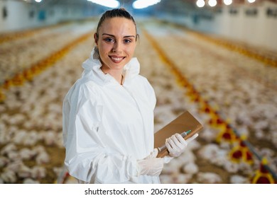 Veterinarian Posing In Chicken Farm