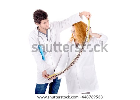 veterinarians posing with wild exotic animals