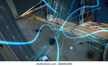 VFX and E-Commerce Visualization of Information Lines Flying from Mobile Phone into Global Digital Network.  Top Down Aerial Drone Shot in Business Downtown District. - Powered by Shutterstock