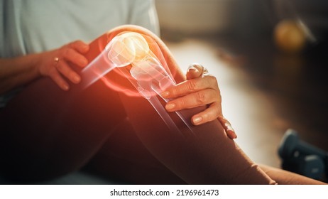 VFX Joint and Knee Pain Augmented Reality Edit. Close Up of a Senior Woman Experiencing Discomfort in a Result of Leg Trauma or Arthritis. Massaging the Muscles to Ease the Injury. - Shutterstock ID 2196961473