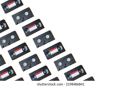 VHS Video Cassette, Old Black Videotape Pattern On A Yellow Background, Outdated Technology Background. 