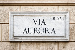 Via Aurora Street Sign On The Wall In Rome, Italy