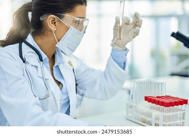 Vial check, research and woman scientist in laboratory with syringe for vaccine, chemistry and healthcare experiment. Study, clinic and pharmaceutical work with medical analysis and virus safety gear - Powered by Shutterstock