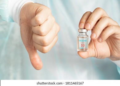 Vial With Usa, American Vaccine For Covid-19 Coronavirus,flu, Infectious Diseases. Anti Vaccination, Stop. Hand Of Doctor. Thumb Down. Clinical Trials Of Injection For Administration For Human,people.