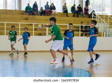 Viana do Castelo, Portugal - February 15, 2020: A.D. Afifense player in action against Becas B, game to count to the Minis Tournament organized by Afifense handball on February15, 2020 in Afife. - Shutterstock ID 1665907834