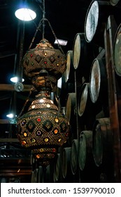 VIANOPOLIS - BETIM, MINAS GERAIS / BRAZIL - JANUARY 2, 2016: A brown and decorated chandelier inside the sugarcane liquor aging barrels warehouse, located behind the big shed in Vale Verde park.