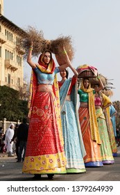 VIAREGGIO, ITALY - MARCH 4, 2012: Festive procession during the renowned Viareggio carnival parade. Spectacular floats depicting caricatures of popular politicians, celebrities or current events.