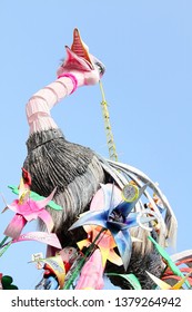 VIAREGGIO, ITALY - MARCH 4, 2012: Festive procession during the renowned Viareggio carnival parade. Spectacular floats depicting caricatures of popular politicians, celebrities or current events.