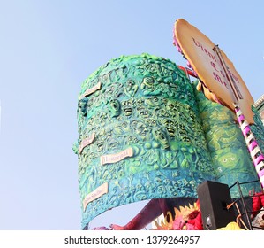 VIAREGGIO, ITALY - MARCH 4, 2012: Festive procession during the renowned Viareggio carnival parade. Spectacular floats depicting caricatures of popular politicians, celebrities or current events.