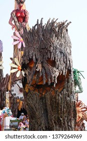 VIAREGGIO, ITALY - MARCH 4, 2012: Festive procession during the renowned Viareggio carnival parade. Spectacular floats depicting caricatures of popular politicians, celebrities or current events.