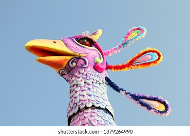 VIAREGGIO, ITALY - MARCH 4, 2012: Festive procession during the renowned Viareggio carnival parade. Spectacular floats depicting caricatures of popular politicians, celebrities or current events.