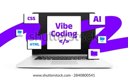 Vibe coding with CSS, HTML, and AI on a laptop at a tech workspace
