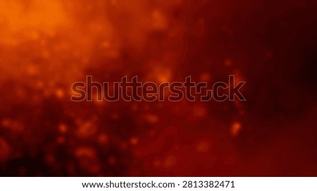 A vibrant abstract background featuring a bokeh effect with glowing orange and red particles, creating a sense of warmth and energy.