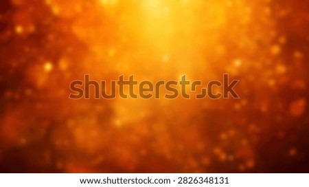 A vibrant abstract background featuring glowing orange and yellow bokeh lights and particles, creating a warm and energetic atmosphere.