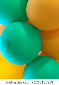 a vibrant abstract background featuring overlapping green and yallow balloon with soft natural lighting the composition creates a clean modern and minimal aesthetic perfect for use in celebrations  party themes branding advertising or festive designs the smooth textures and bright color contrast offer a fresh and cheeful visual suitable  for booth digital and print projects 