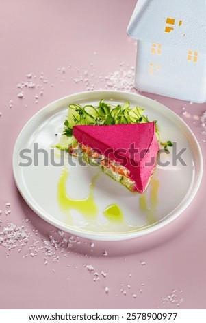 Vibrant Beetroot Mousse Cake with Fresh Garnish on Pink Background	