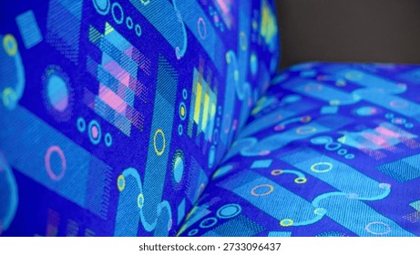 Vibrant Blue Abstract Geometric Pattern Detail on Public Transport Upholstery Fabric